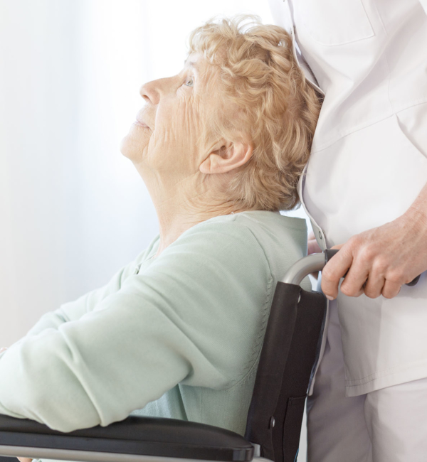 Assistant helps elderly woman Senior Caregivers Boca Raton