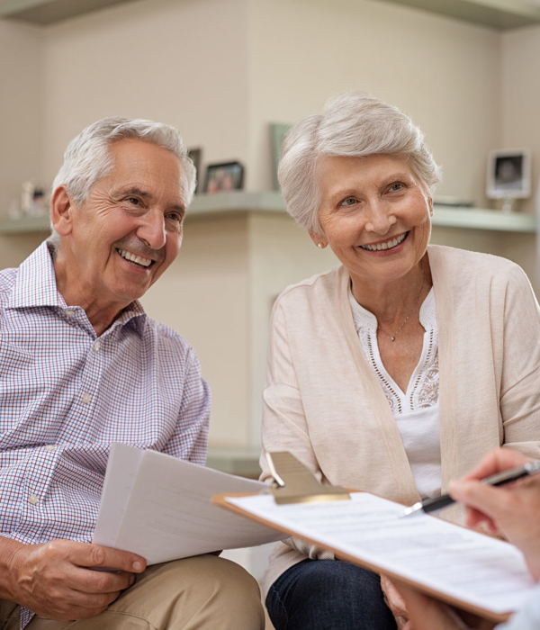 Senior couple meeting financial advisor Long Term Care Boca Raton